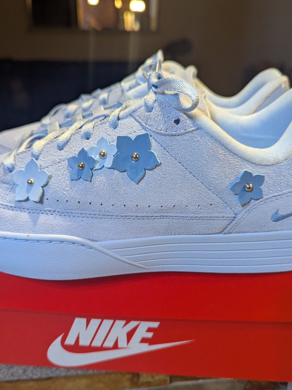 Nike Women’s Light Blue Suede Floral Accent Sneakers